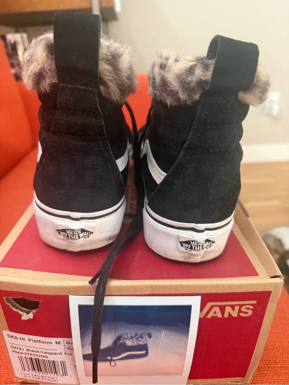 Vans Women's Black High-Top Sneakers with White Stripe and Faux Fur